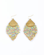 A pair of elegant beaded fringe earrings featuring brushed gold diamond-shaped tops with dangling strands of pastel multi-colored seed beads in pink yellow and light blue, each culminating in a small gold teardrop on a plain white background