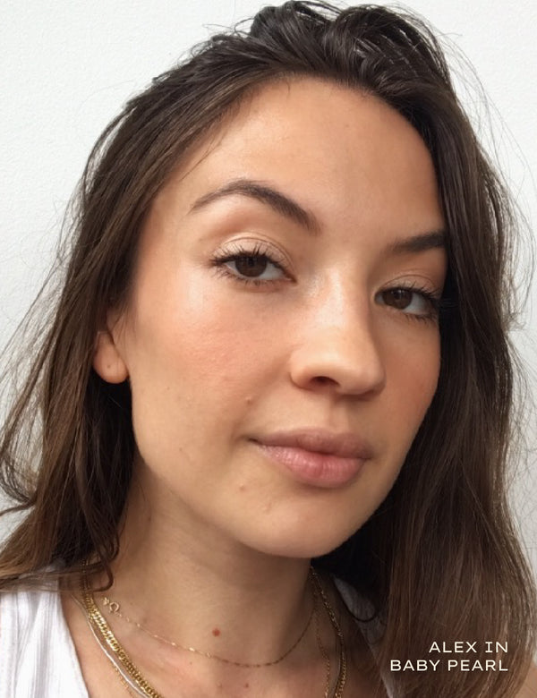 Close up portrait of a woman wearing Baby Pearl makeup