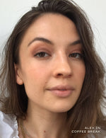 Close up portrait of a woman wearing neutral eyeshadow and lipstick