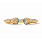 Gold cuff bracelet with blue gemstone accents