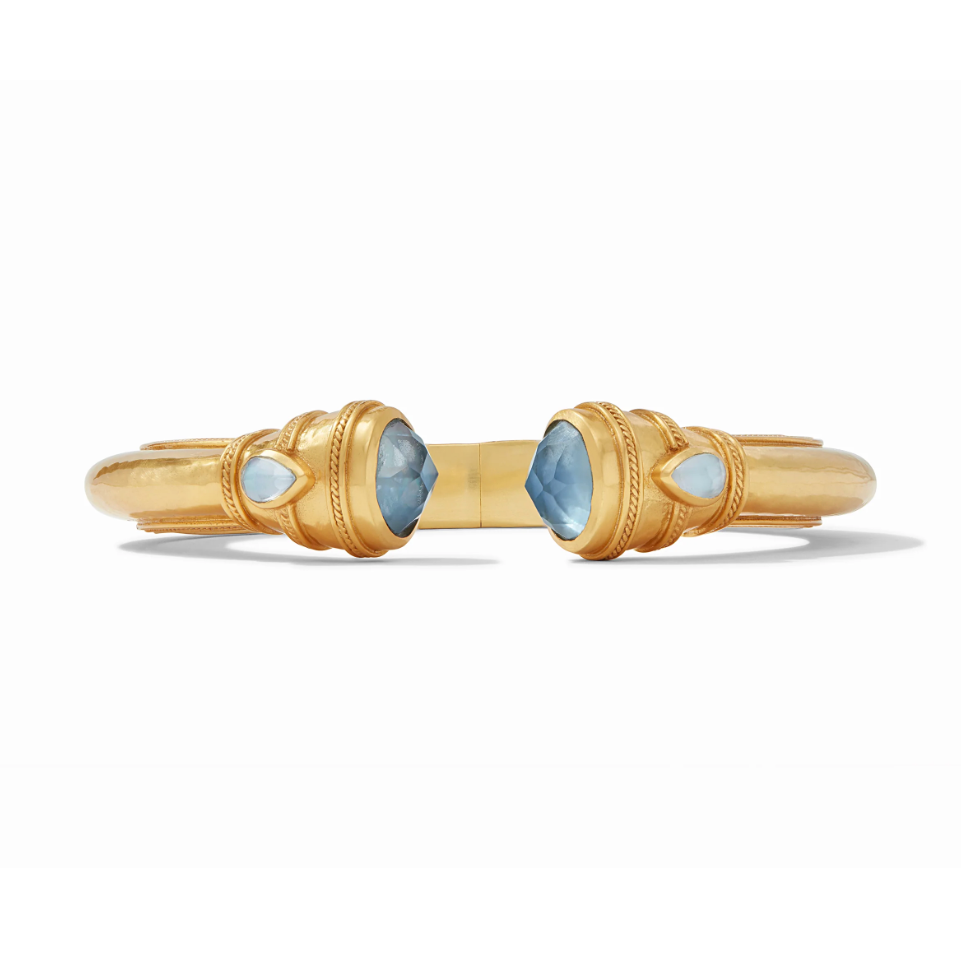 Gold cuff bracelet with blue gemstone accents