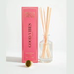 Aroma Avenue diffuser with pink packaging and clear bottle on a white background