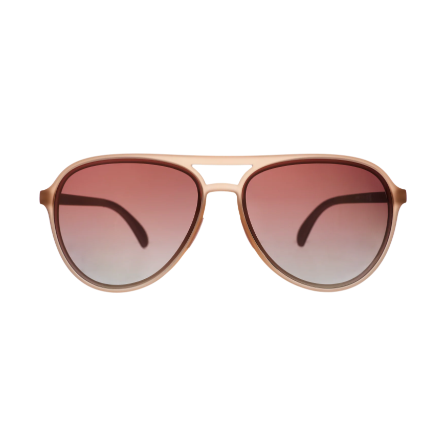 Aviator sunglasses with matte beige frames, gradient rose-to-clear lenses, and a classic double bridge design