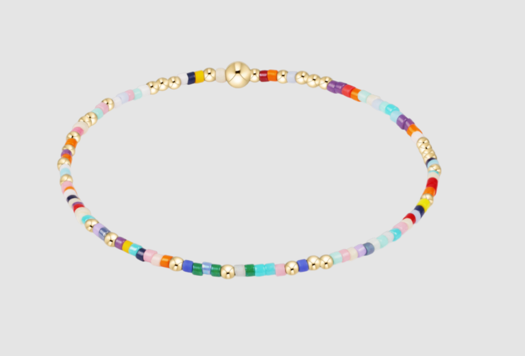 Colorful beaded bracelet on a light gray background