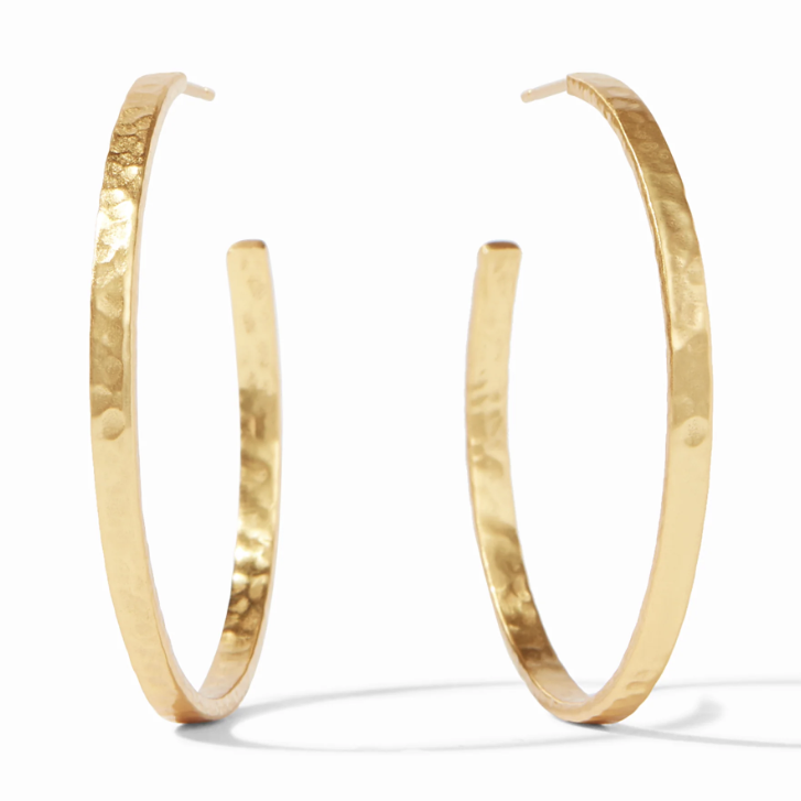 Pair of gold hoop earrings with a hammered texture