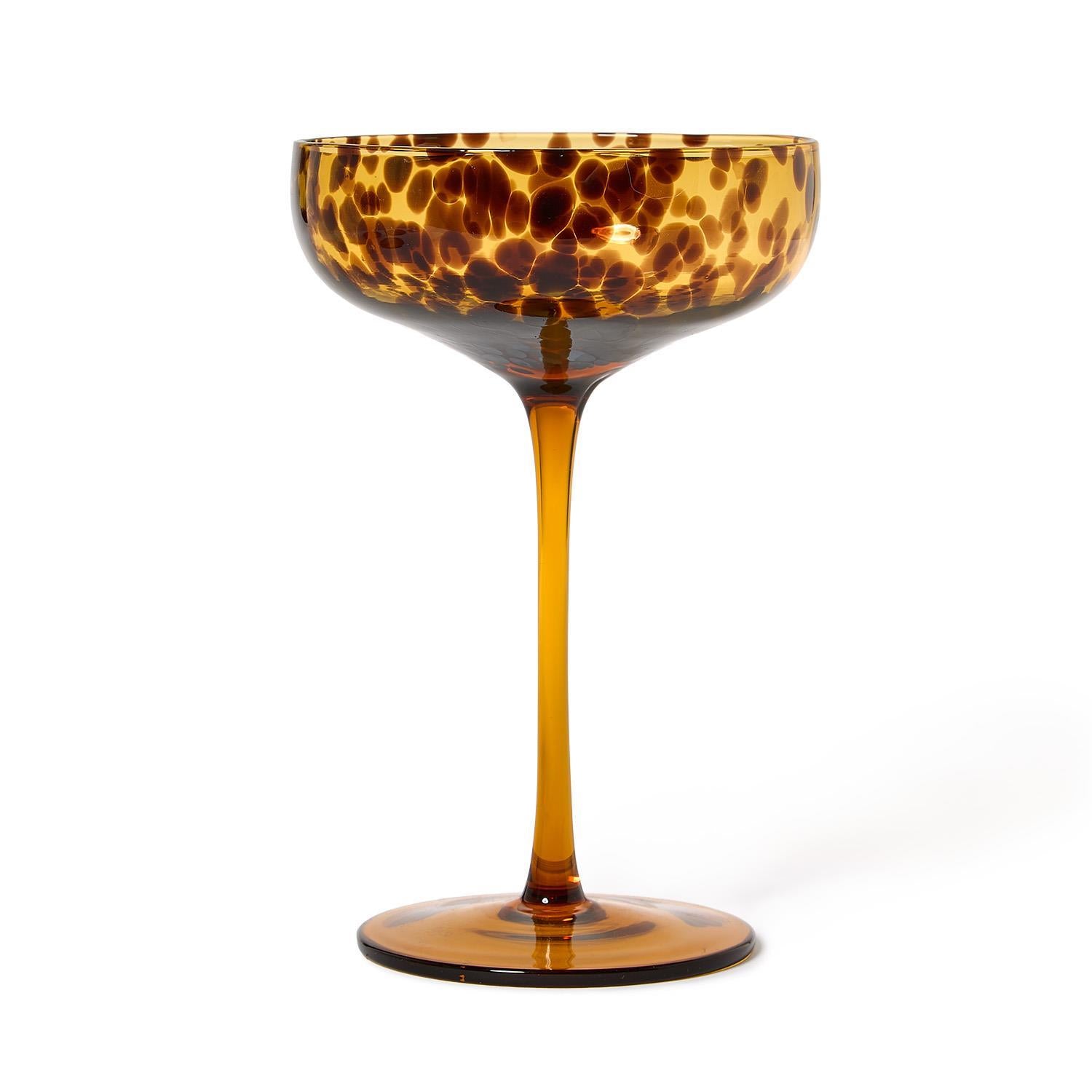 Amber glass coupe with brown leopard print pattern