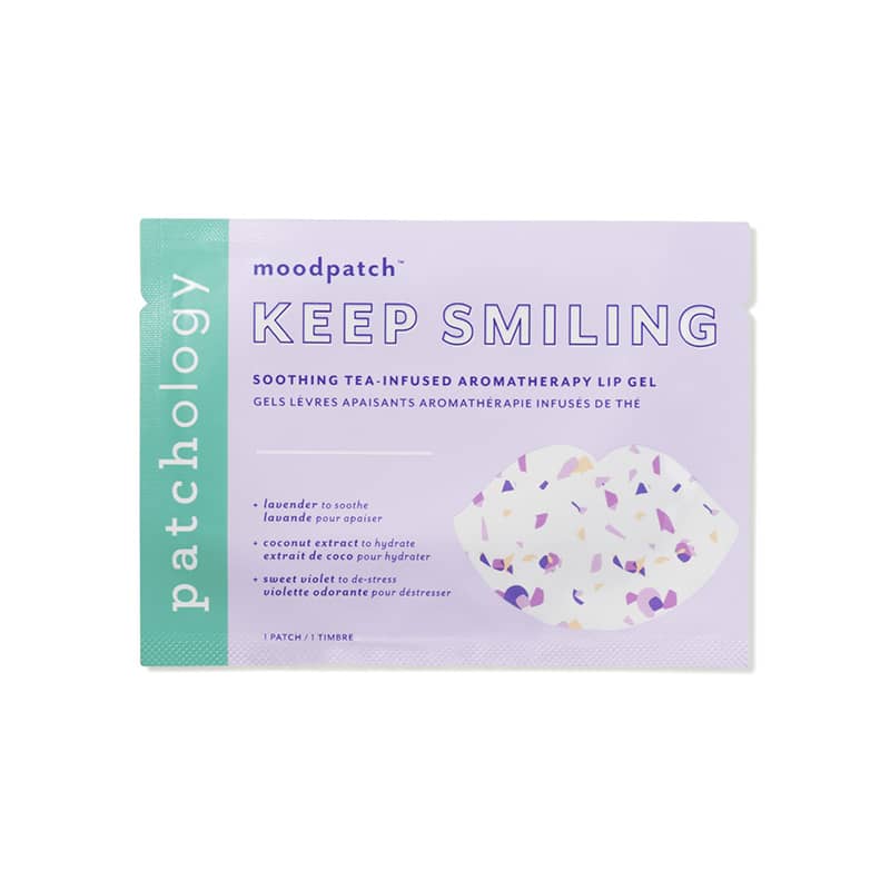 Digital product photograph by Patchology of a Keep Smiling aromatherapy lip gel sachet on a white background featuring a vertical teal brand logo a light lavender face and a decorative lip-shaped graphic filled with multicolored purple and pink patterns