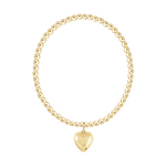 Gold beaded stretch bracelet with a heart charm