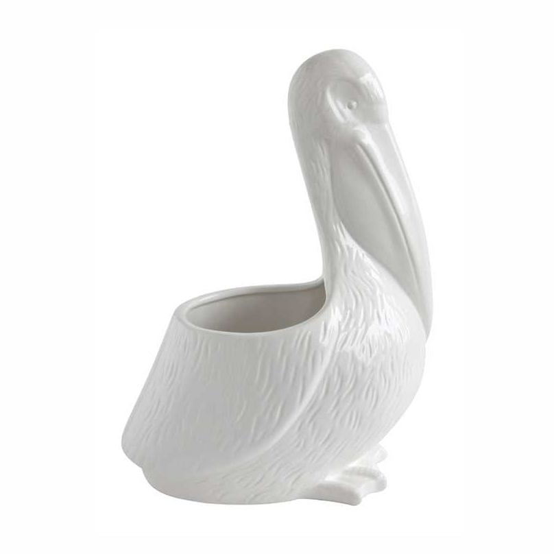 White ceramic pelican planter on a white background