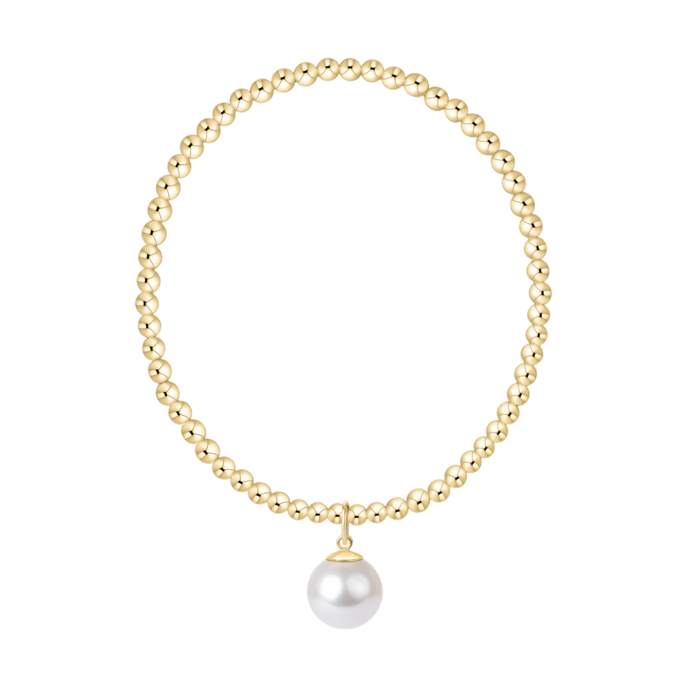 Gold bead necklace with a single white pearl pendant