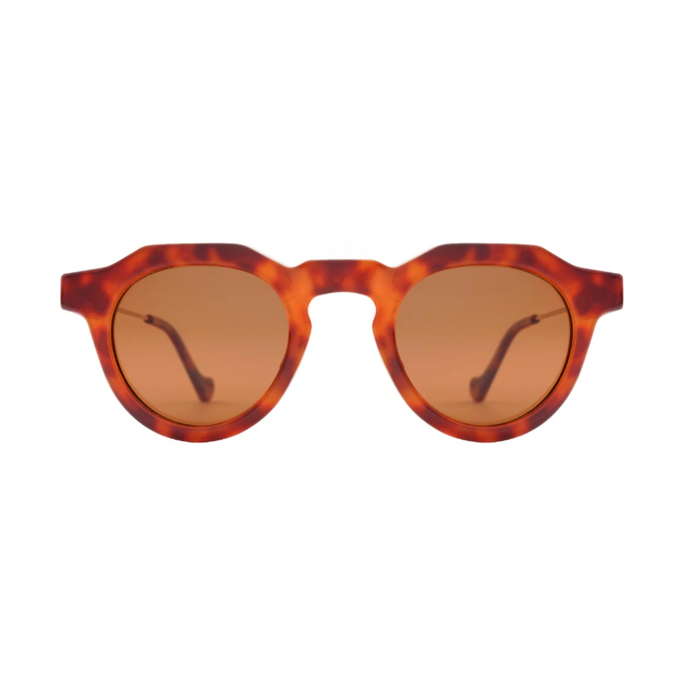 Sunglasses with tortoiseshell frame and brown lenses on a white background