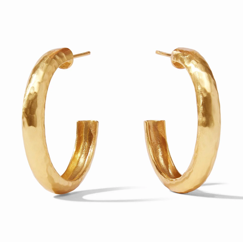 Pair of gold hoop earrings with a hammered texture