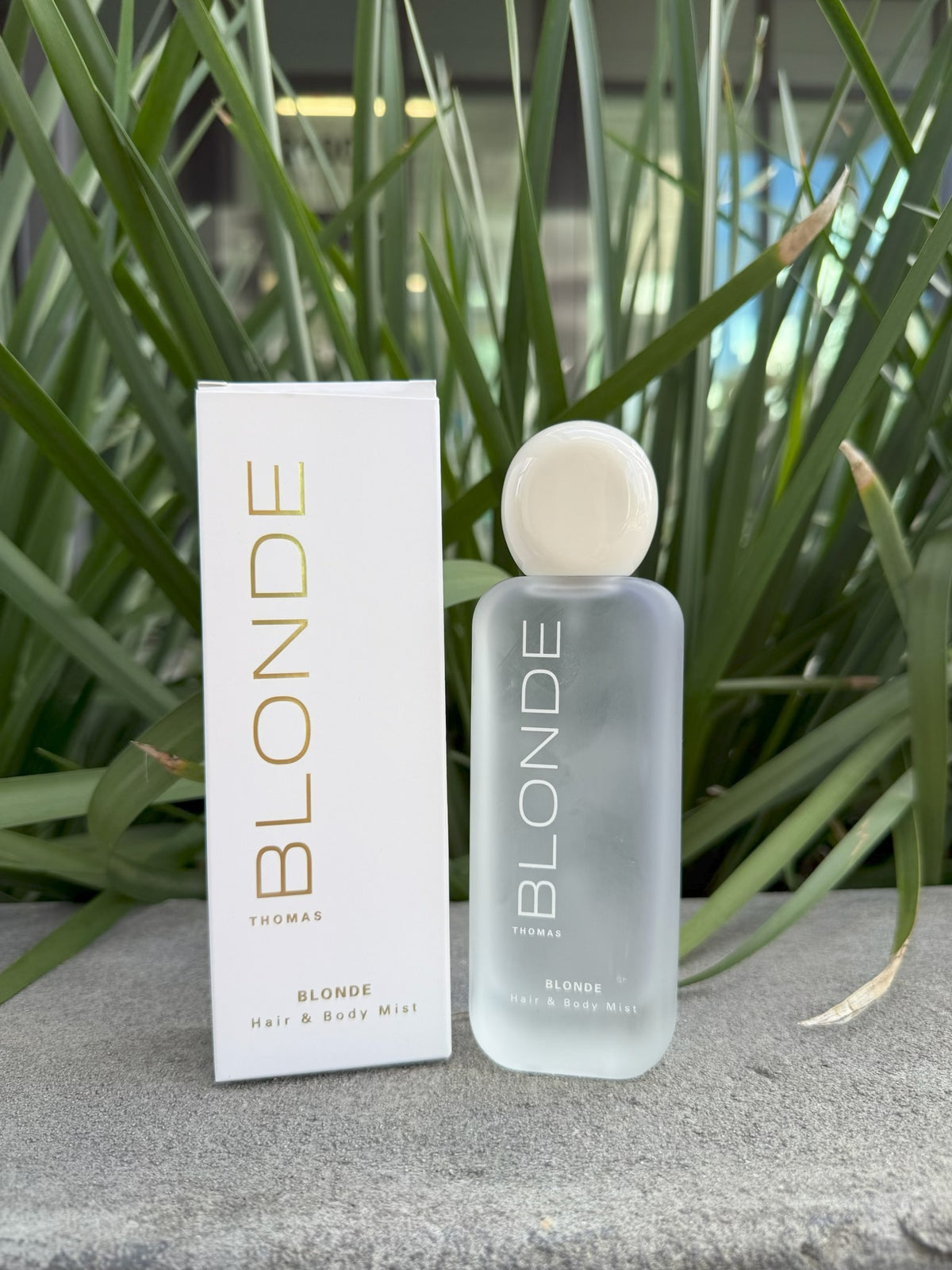 Thomas Blonde hair and body mist bottle beside its box