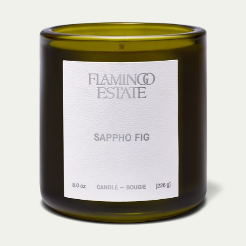 Flamingo Estate Sappho Fig candle in a green glass vessel