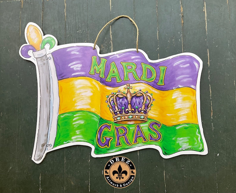 Door hanger of a purple, gold and green waving flag reading "Mardi Gras" with a crown