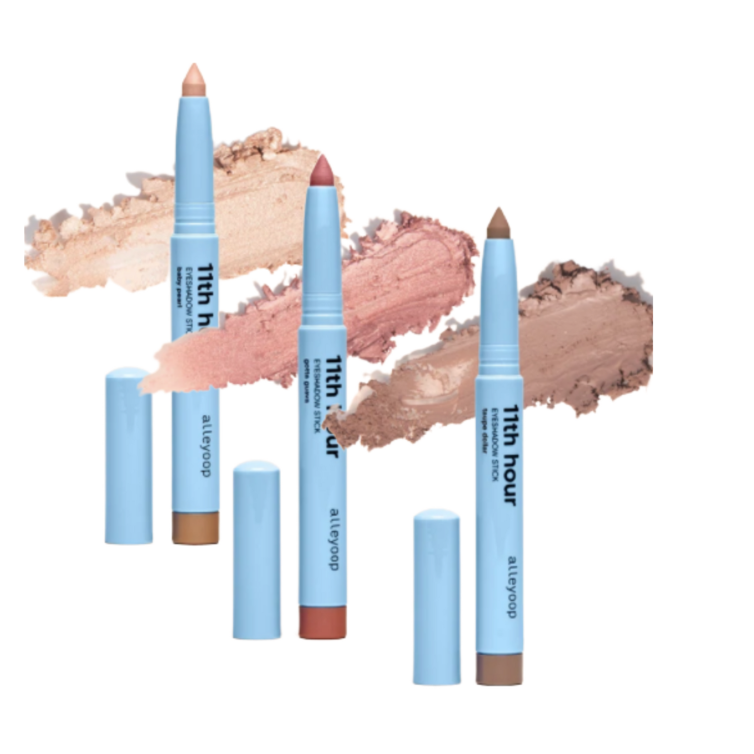 A collection of cream eyeshadows in various shades, with visible blue sticks and soft, muted colors.