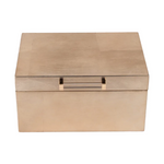 A gold-colored, velvet-lined jewelry box with a removable tray.