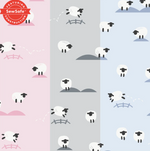 A repeating digital textile pattern depicting playful white cartoon sheep with black faces jumping over stylized fences and standing on small hills across vertical sections colored pink, gray, and light blue, featuring a red SewSafe Construction badge