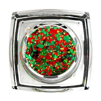 A clear square pot filled with chunky red and green holiday glitter including small gold flecks