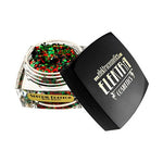 Product photo by Elektra Cosmetics featuring an open clear jar of Special Edition Bolt Balm vibrant red and green glitter beside a black lid with a gold Elektra Cosmetics logo