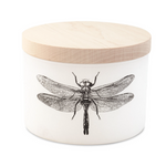 White ceramic container with a natural light wood lid featuring a detailed black line art dragonfly illustration with spread wings