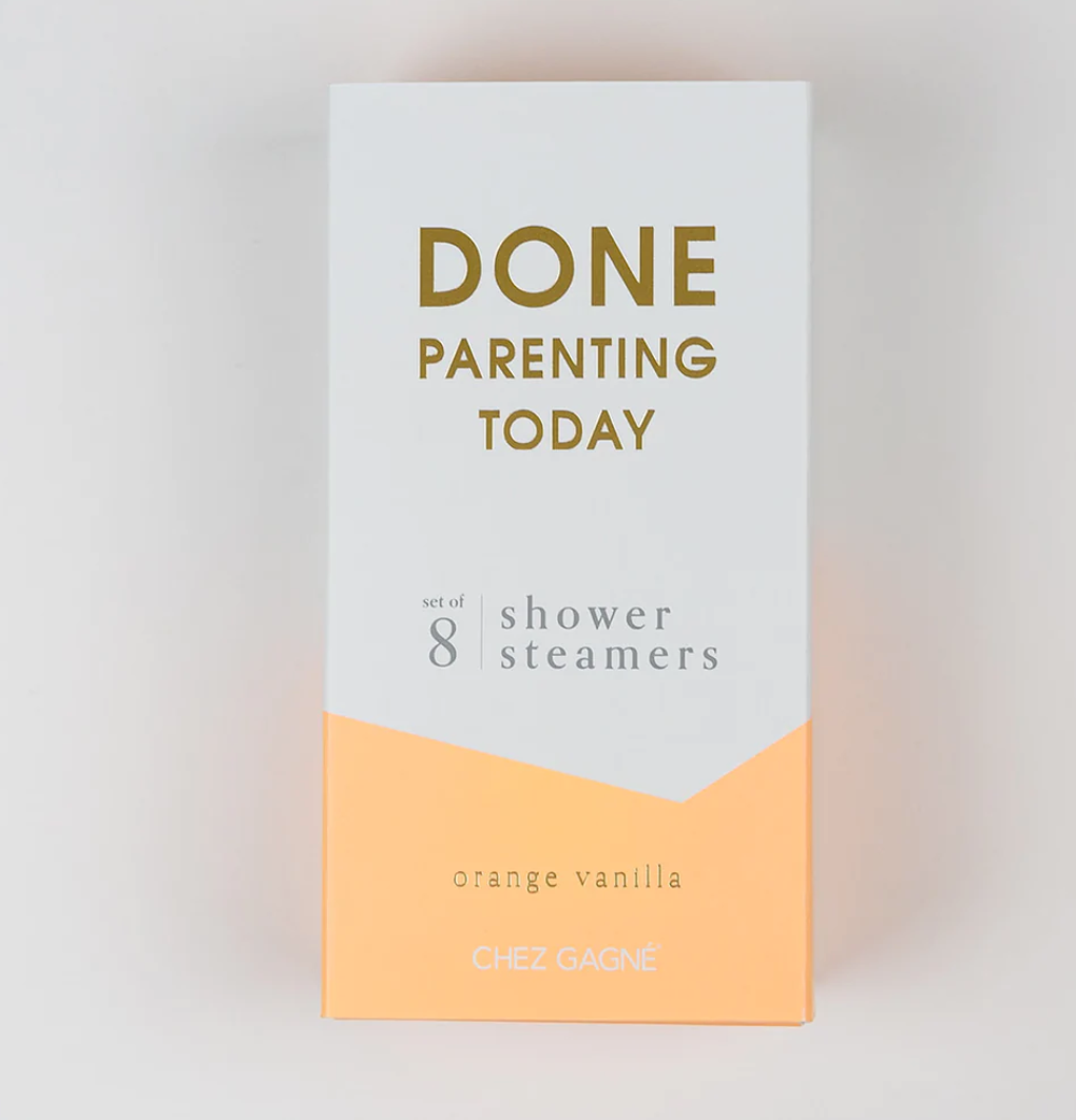 Product image by Chez Gagné showing a white and orange box of eight orange vanilla shower steamers with bold gold text reading DONE PARENTING TODAY