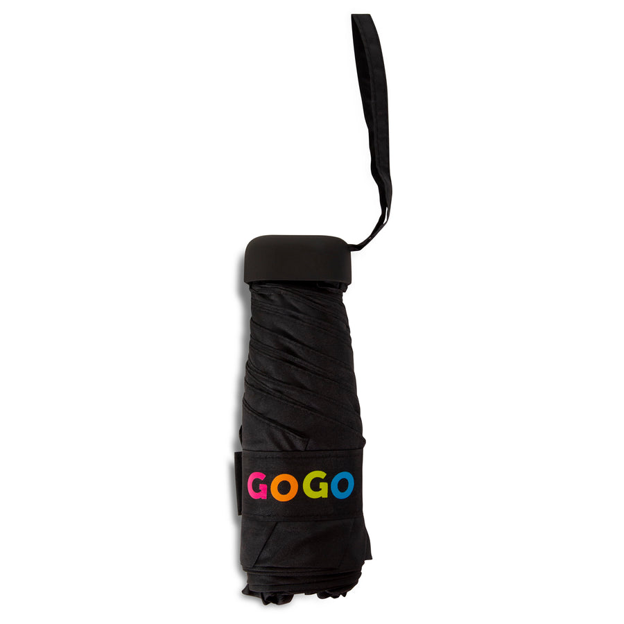 A folded compact black umbrella with a black wrist strap and a colorful "GOGO" logo in pink, orange, yellow, and blue on its closure band
