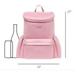 Product photo of a light pink Corkcicle backpack with its logo, featuring a front flap and pocket, accompanied by bottle and can outlines for scale and dimensions of 17x12 inches
