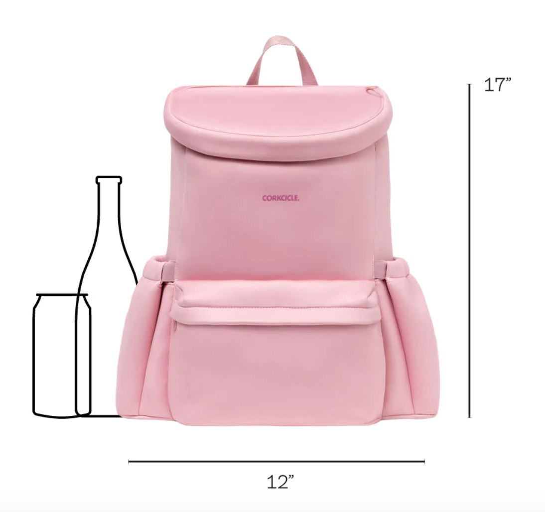Product photo of a light pink Corkcicle backpack with its logo, featuring a front flap and pocket, accompanied by bottle and can outlines for scale and dimensions of 17x12 inches