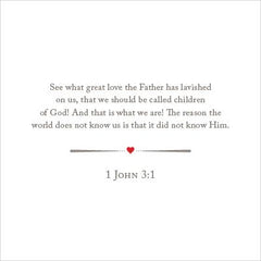 Bible verse graphic featuring the scripture 1 John 3:1 in gray font on a white background, highlighted by a small red heart dividing line