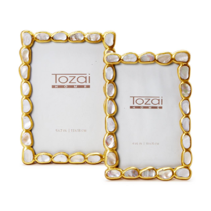 Two Tozai Home gold-finished photo frames featuring irregular mother-of-pearl inlay in 5x7 and 4x6 inch sizes