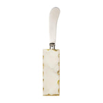 Elegant butter knife with a rectangular white stone handle featuring jagged gold leaf accents and a polished silver blade