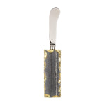 A modern butter knife featuring a polished silver blade and a dark grey rectangular handle with organic rough gold gilded edges