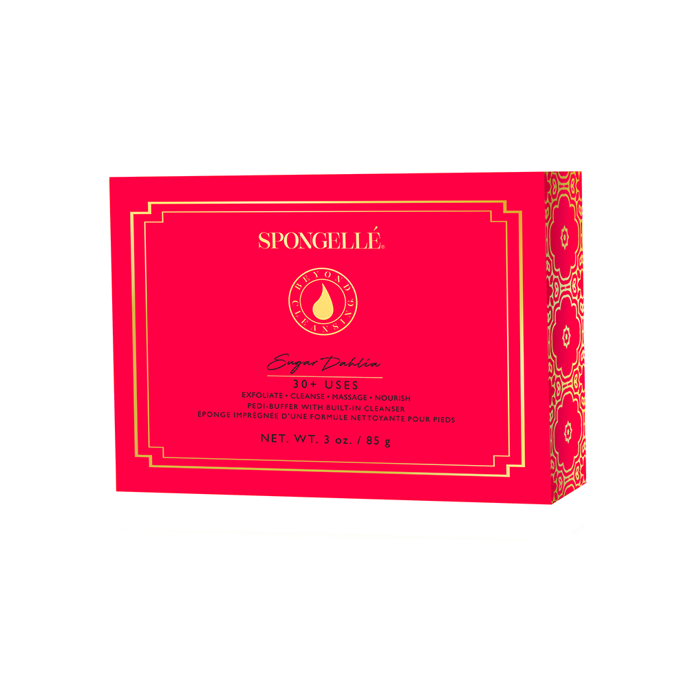Spongellé Sugar Dahlia Pedi-Buffer box in bright red with a gold border, "Beyond Cleansing" logo, and decorative gold pattern on the side, showcasing "30+ Uses"