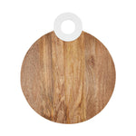 Wooden cutting board a round light brown board with natural wood grain and a distinctive white circular handle isolated on a white background
