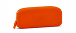 A vibrant orange smooth silicone pouch on a white studio background featuring a white zipper with an orange pull tab and a subtle embossed P logo