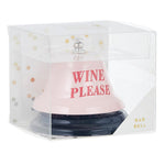 Product image of a decorative pink bar bell with bold red "Wine Please" text and a silver clapper, standing on a black base within a clear plastic gift box featuring gold confetti dots and a "BAR BELL" label