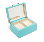 interior shot of a blue jewelry box with two compartments on a white background