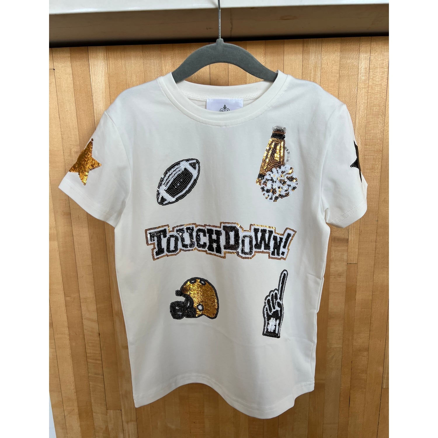 youth white tshirt with sequined appliques.