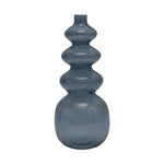 A blue glass vase with a smooth, rounded shape and a long, curved neck.