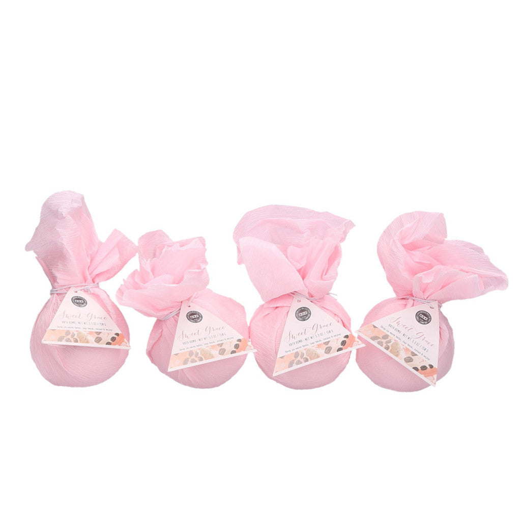 Four pink bath bombs tied with pink ribbons, each with a label indicating the fragrance 'Sweet Grace'.